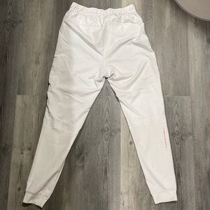 Nike sweatpants, white with blue and red logo and waistband, standard size small